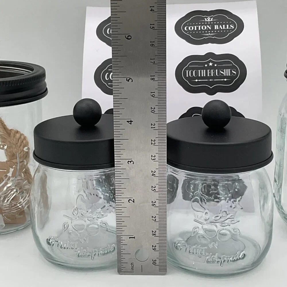 mason jar bathroom accessories with a sheet of labels for organization